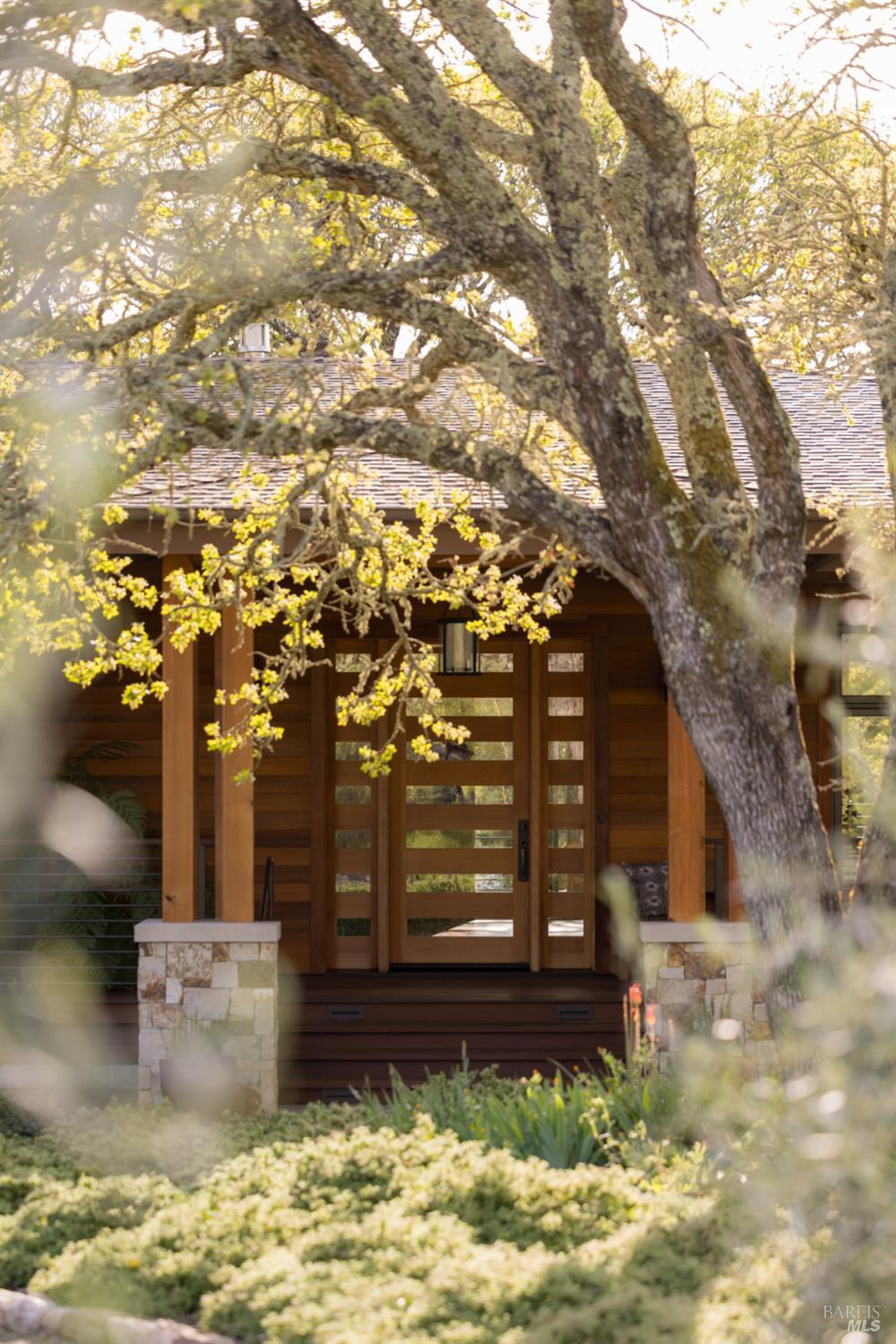 3525 Wood Valley Road Sonoma, CA 95476 - Photo 13 of 39 a front view of a house with a yard