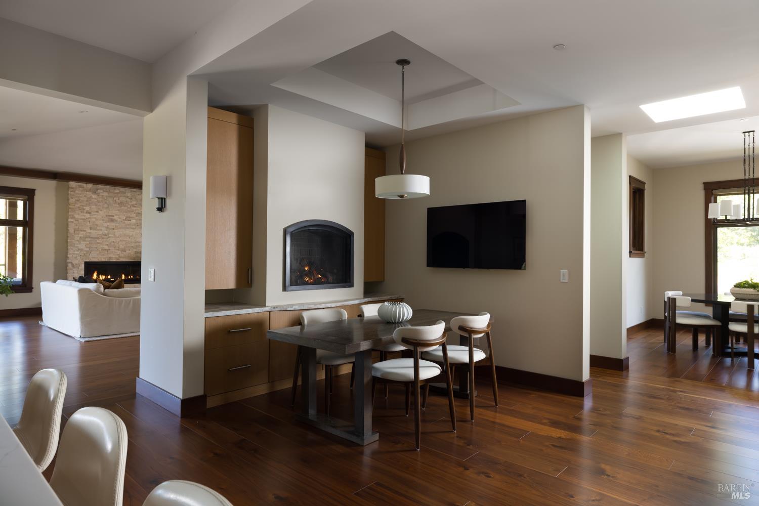 3525 Wood Valley Road Sonoma, CA 95476 - Photo 15 of 39 a view of a dining room with furniture and wooden floor