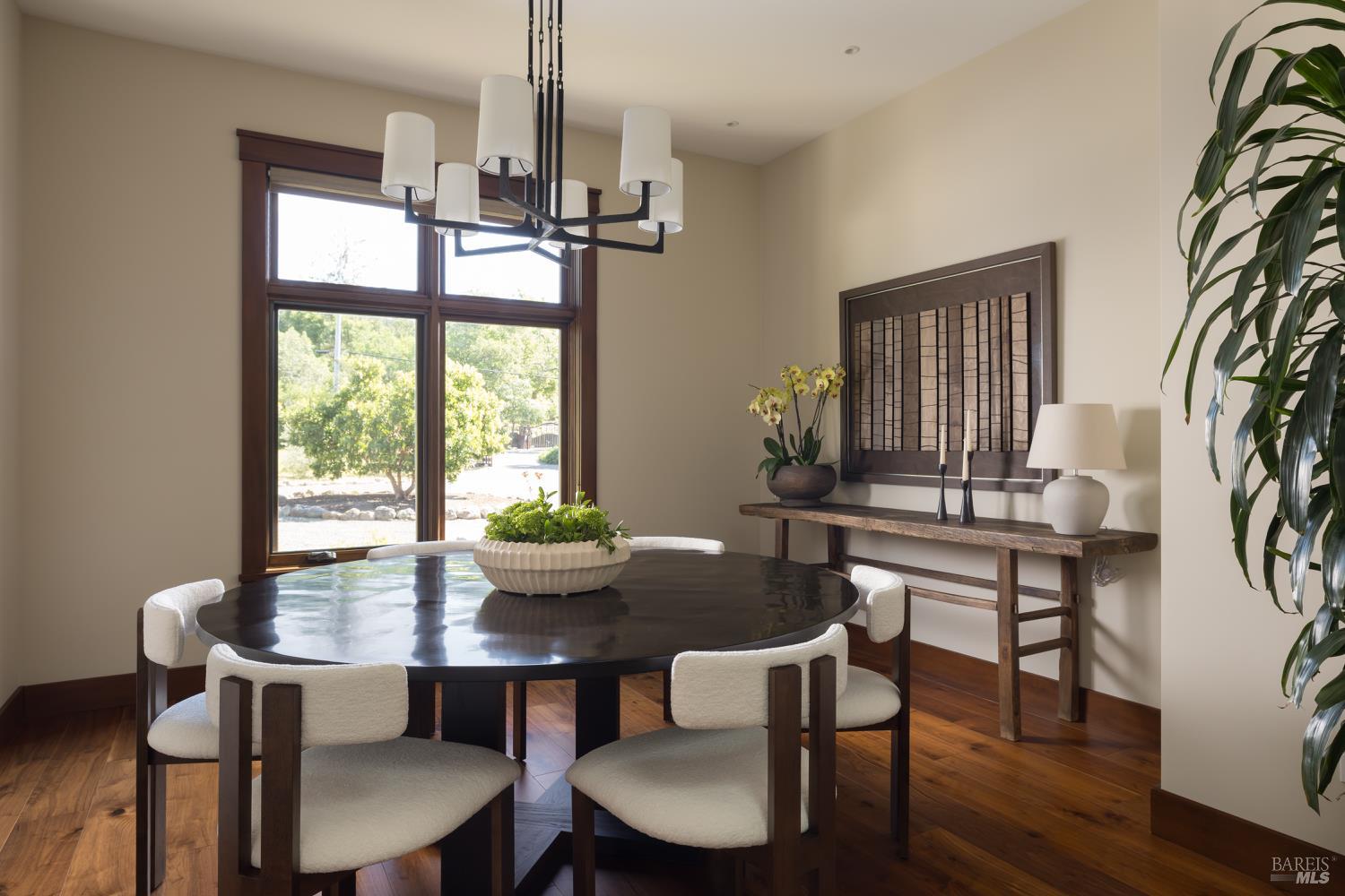 3525 Wood Valley Road Sonoma, CA 95476 - Photo 16 of 39 a view of a dining room with furniture window and wooden floor