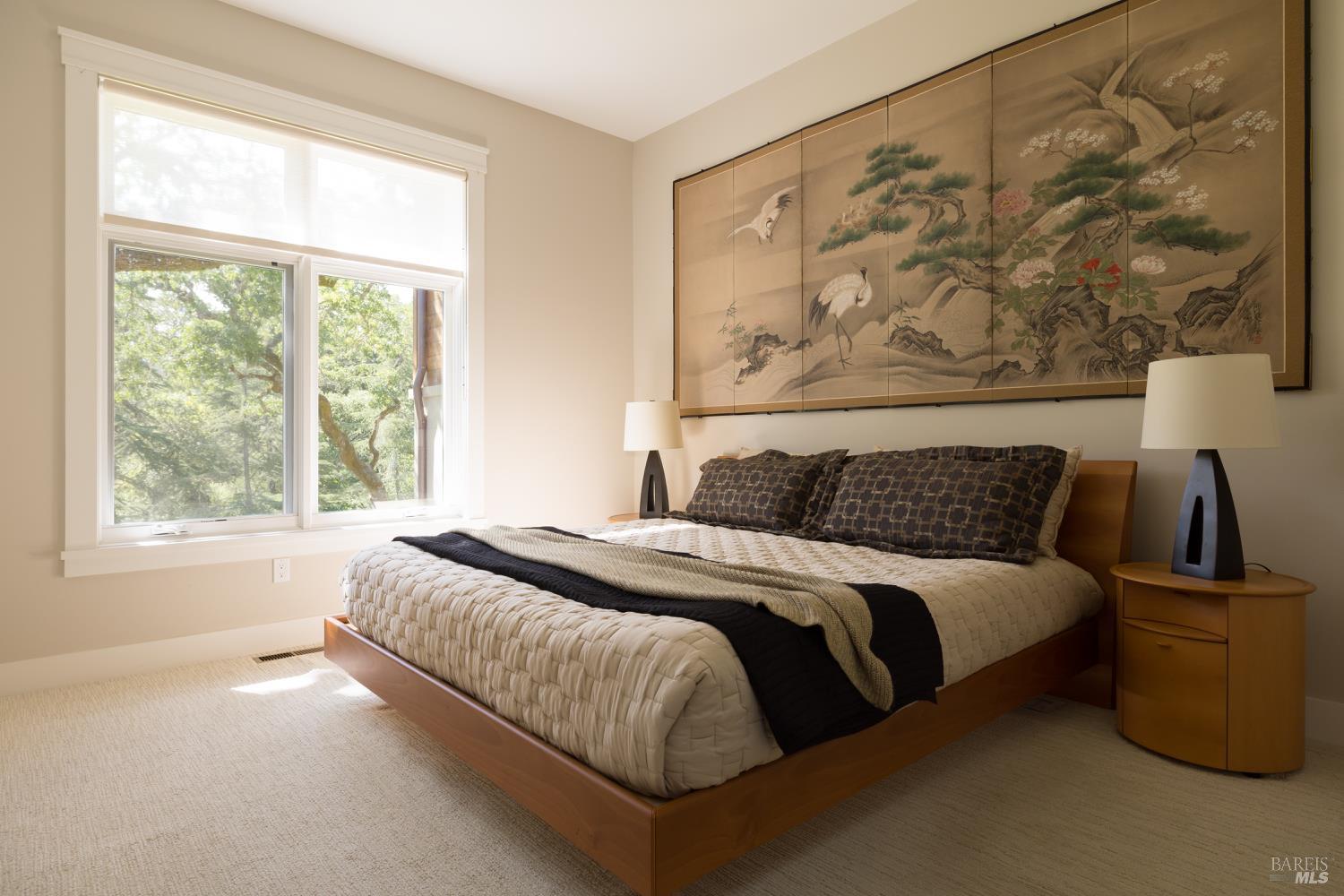 3525 Wood Valley Road Sonoma, CA 95476 - Photo 19 of 39 a bed sitting in a bedroom next to a window