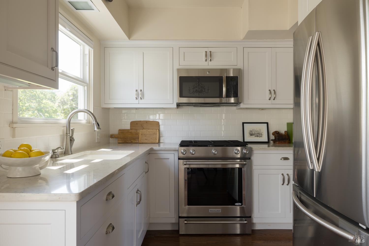 3525 Wood Valley Road Sonoma, CA 95476 - Photo 32 of 39 a kitchen with stainless steel appliances a stove microwave and a sink