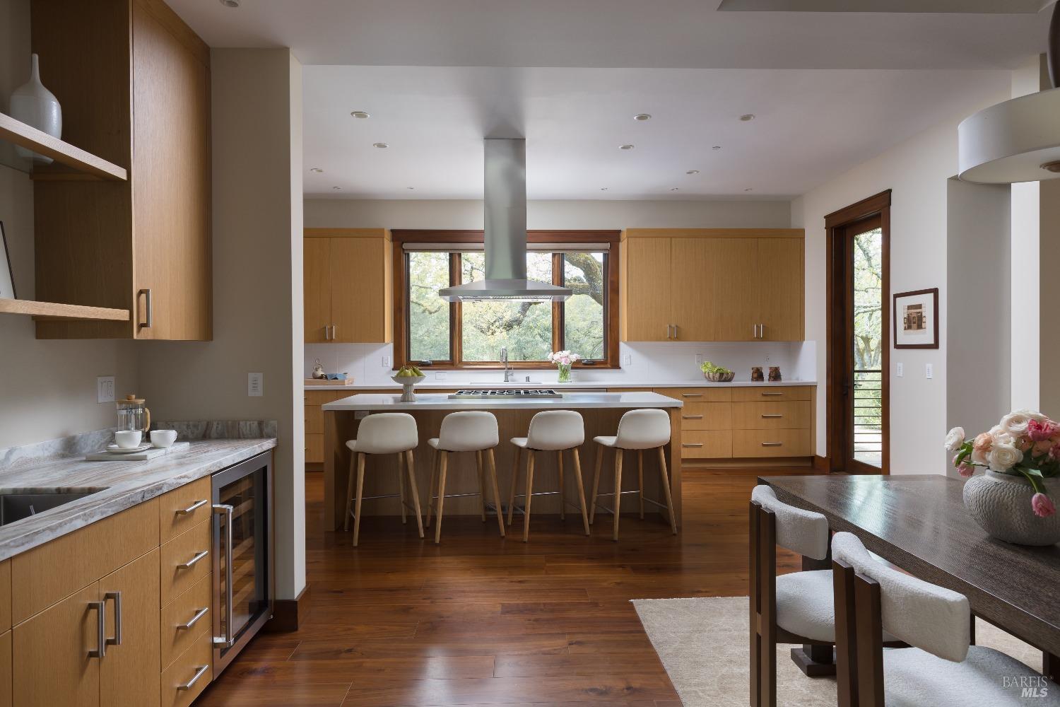 3525 Wood Valley Road Sonoma, CA 95476 - Photo 4 of 39 a large kitchen with a table and chairs
