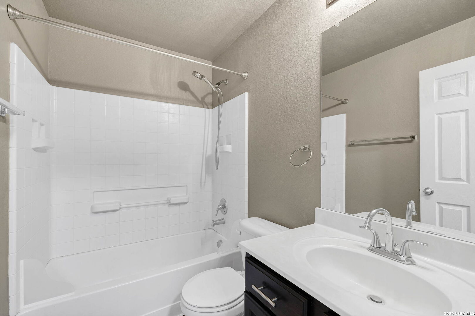 4015 Shervin Way Converse, TX 78109 - Photo 33 of 43 a bathroom with a sink a toilet and a bathtub