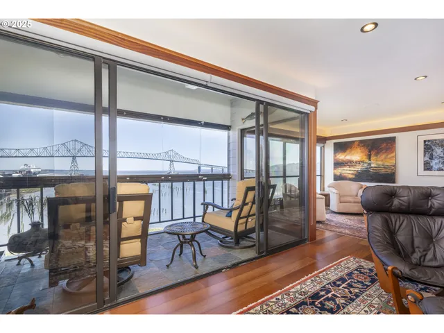 a view of a living room and dining room