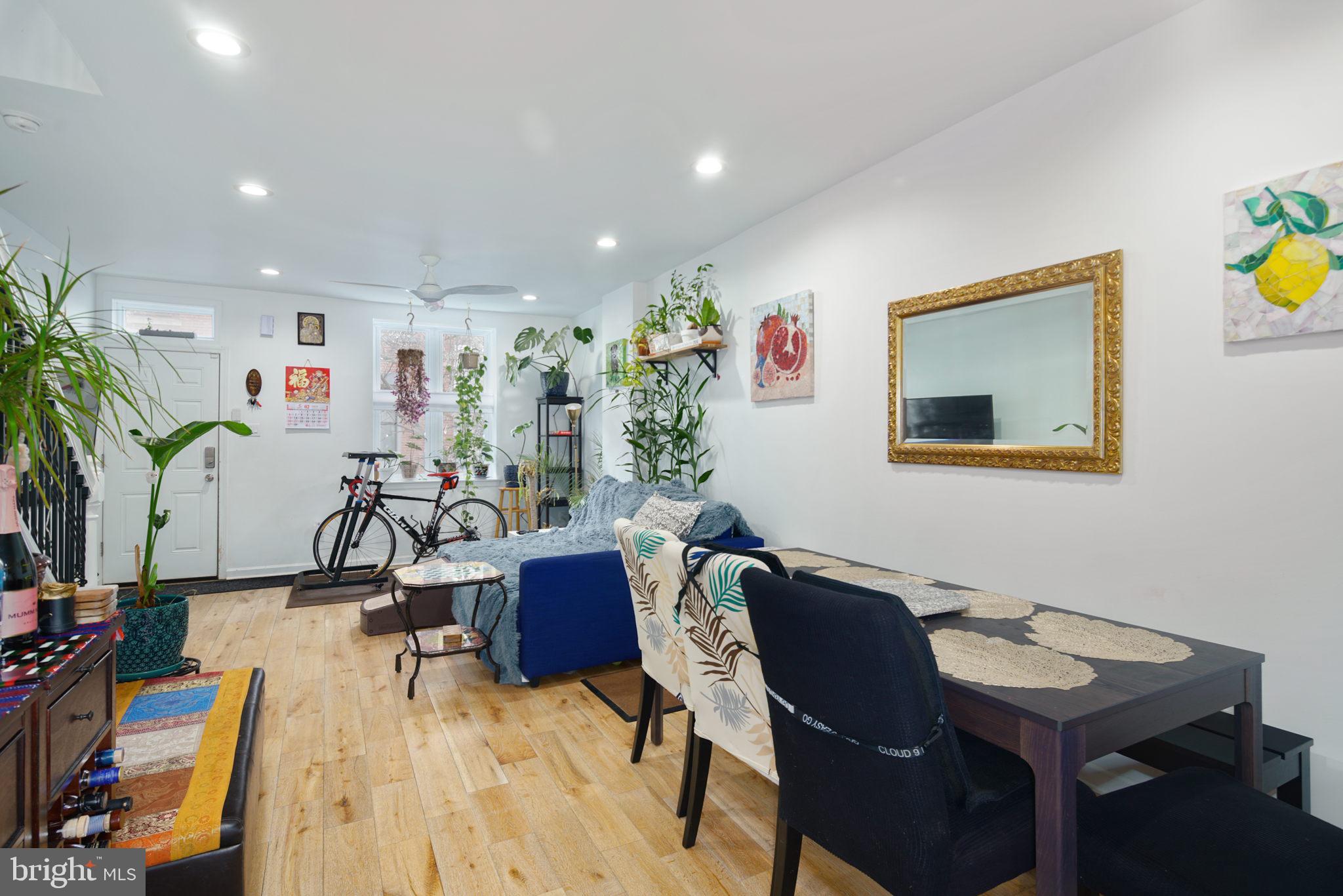 3045 Baltz Street Philadelphia, PA 19121 - Photo 3 of 18 a view of a livingroom with furniture and a workspace
