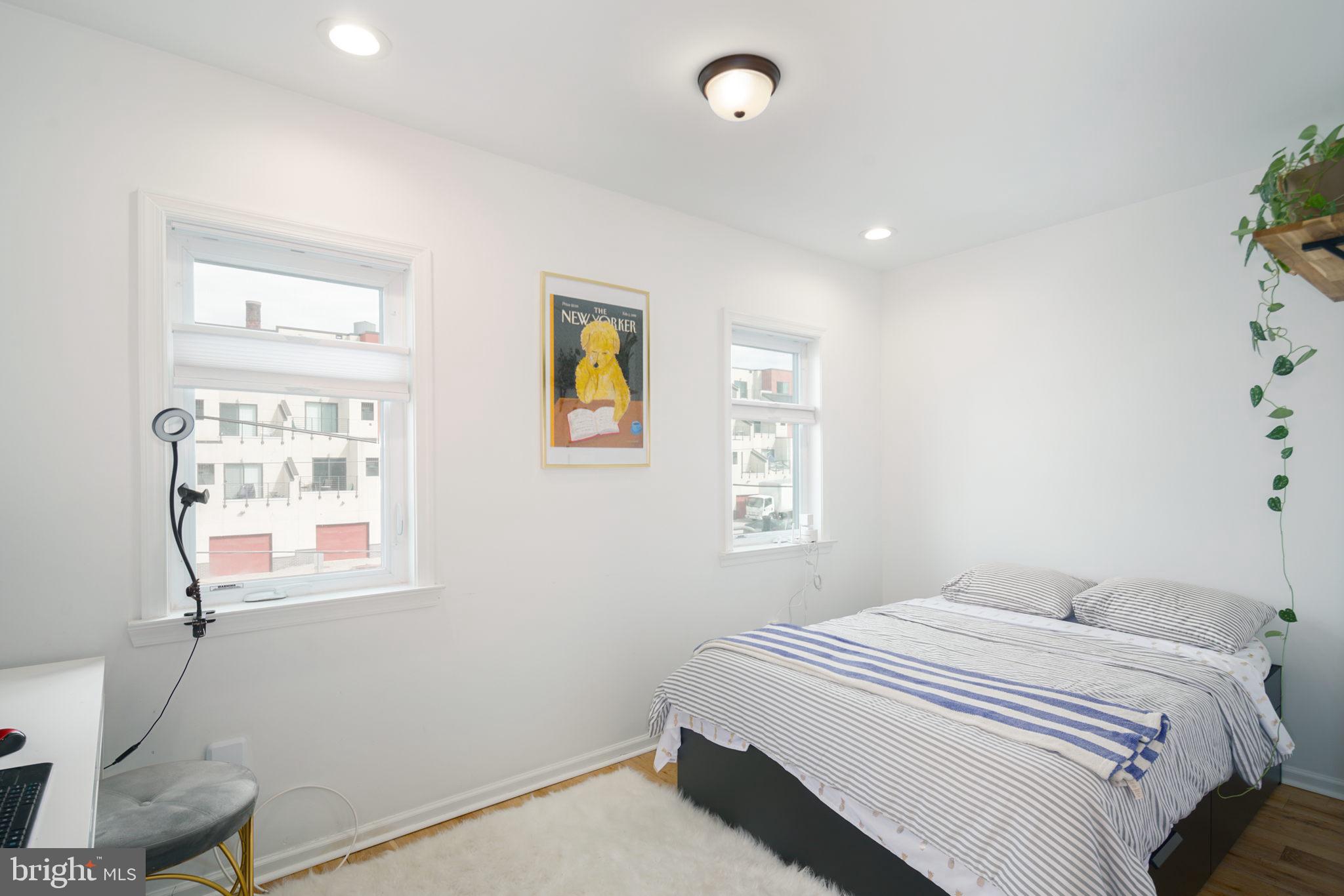 3045 Baltz Street Philadelphia, PA 19121 - Photo 7 of 18 a bedroom with a bed and a window