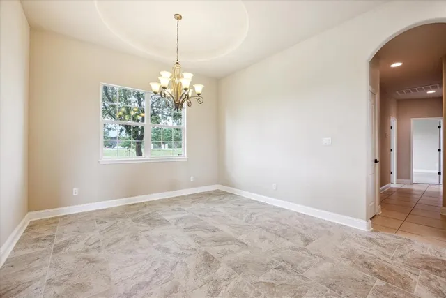 a view of a kitchen with a sink stainless steel appliances and cabinets