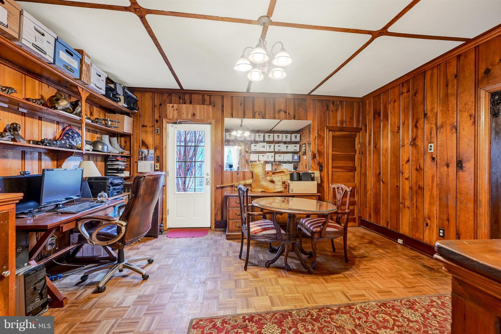 6406 Old Harford Road Baltimore, MD 21214 - Photo 12 of 26 a work room with furniture and musical instruments