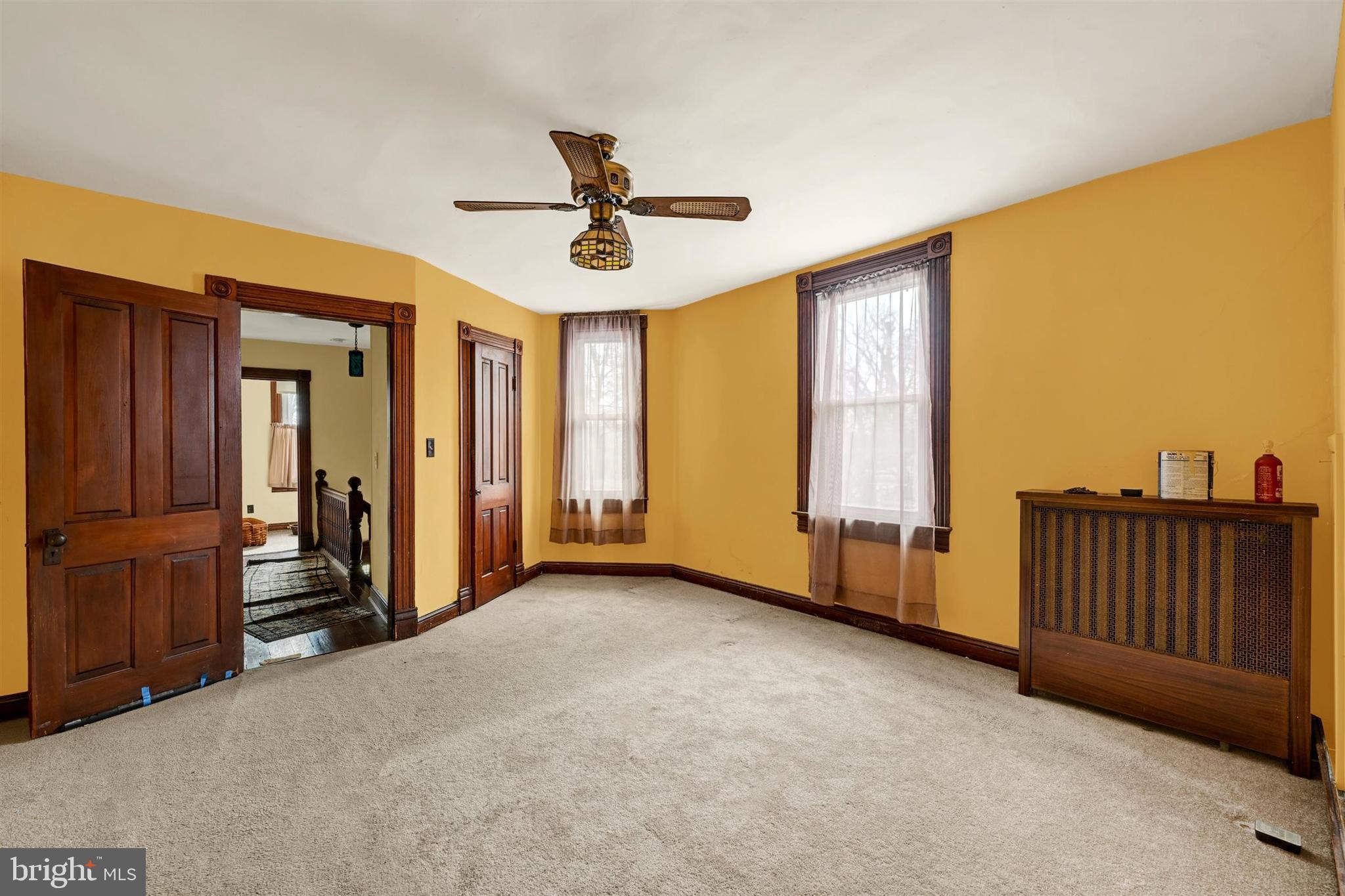 6406 Old Harford Road Baltimore, MD 21214 - Photo 19 of 26 a view of a room with staircase front door