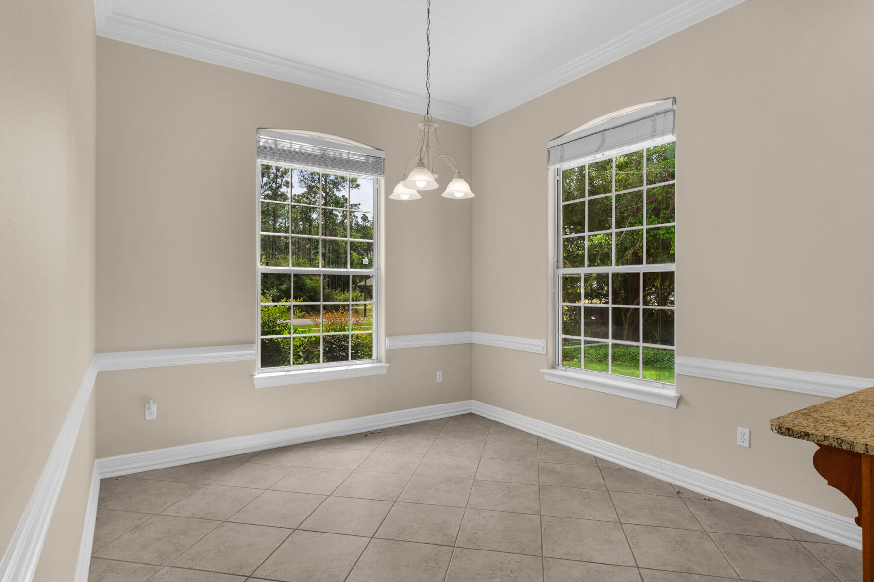155 Club House Drive East Freeport, FL 32439 - Photo 14 of 34 a view of an empty room with a window