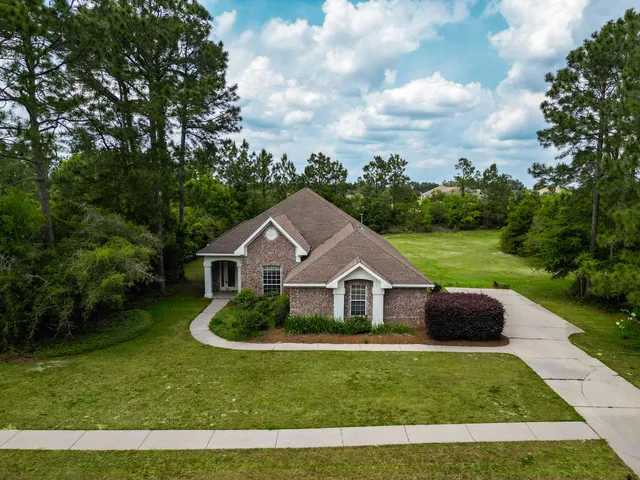 a view of a yard in front of house