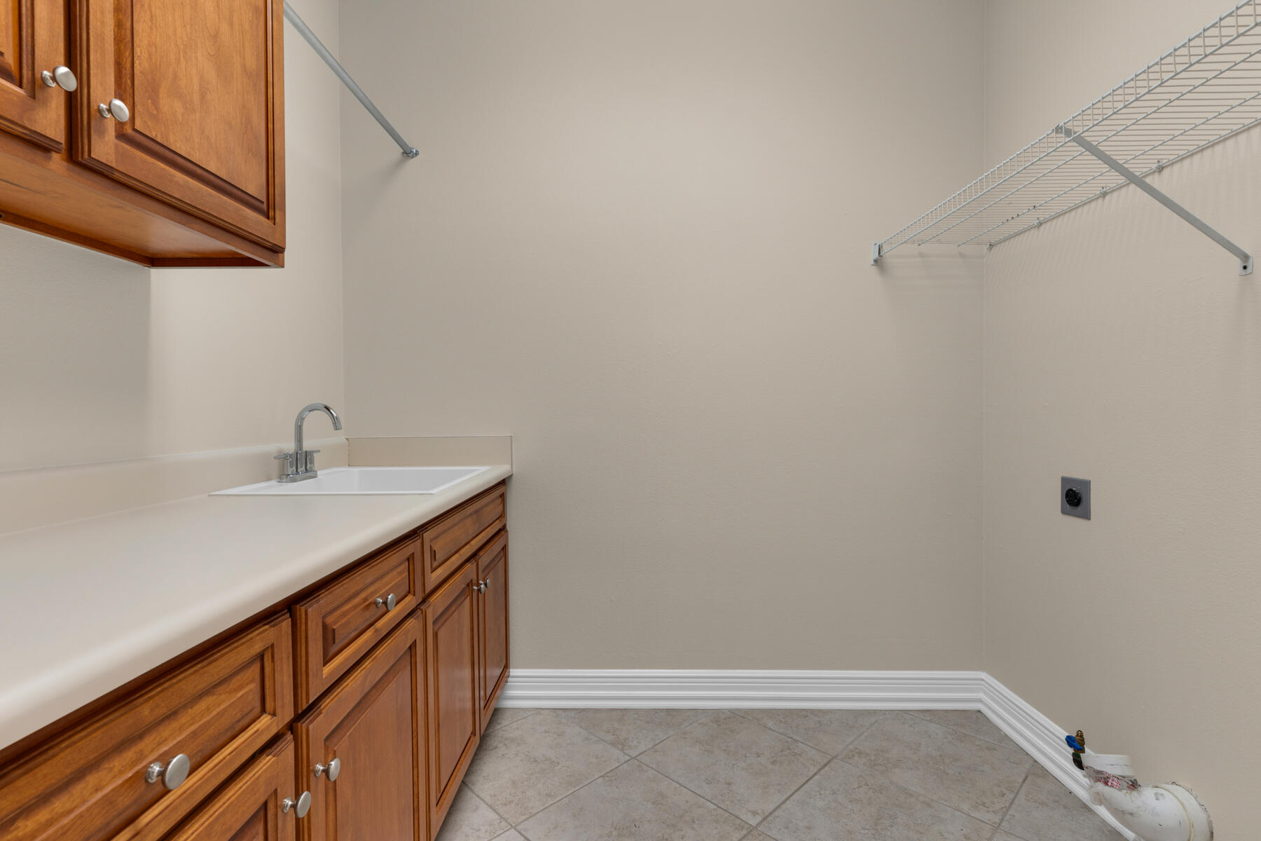 155 Club House Drive East Freeport, FL 32439 - Photo 24 of 34 a utility room with sink
