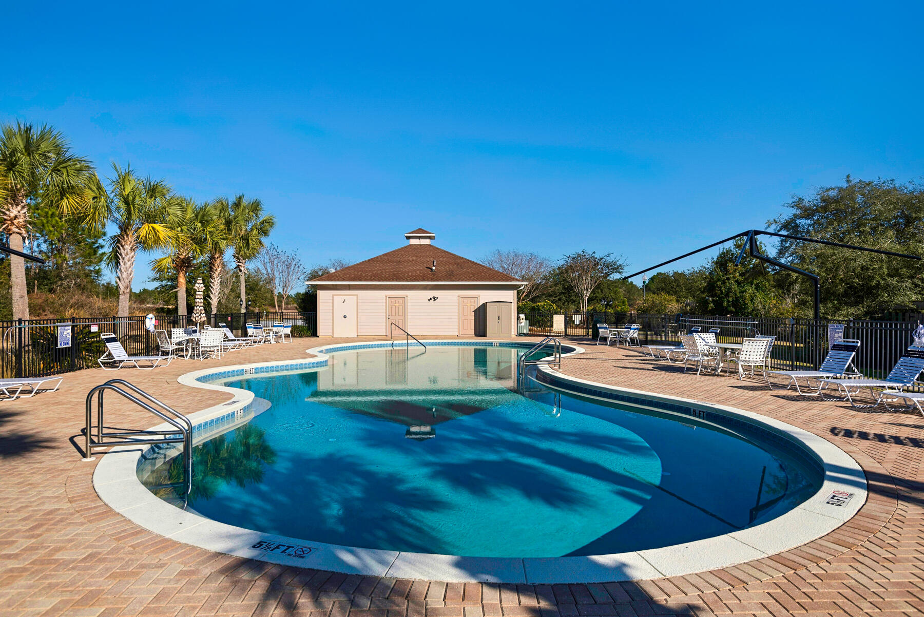 155 Club House Drive East Freeport, FL 32439 - Photo 34 of 34 a swimming pool with outdoor seating and yard