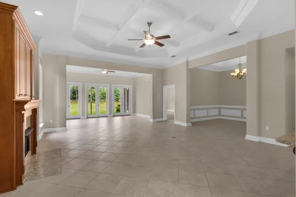 a view of livingroom with hardwood floor and ceiling fan