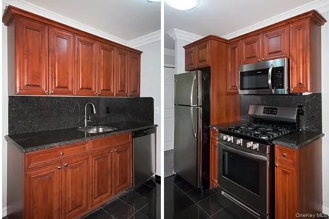 a kitchen with stainless steel appliances granite countertop a stove refrigerator and microwave