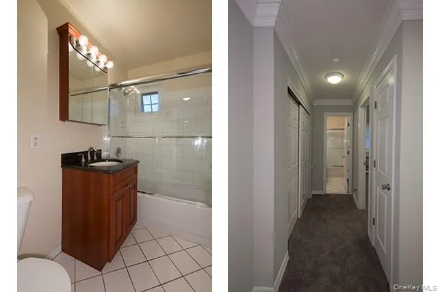 a bathroom with a glass shower door