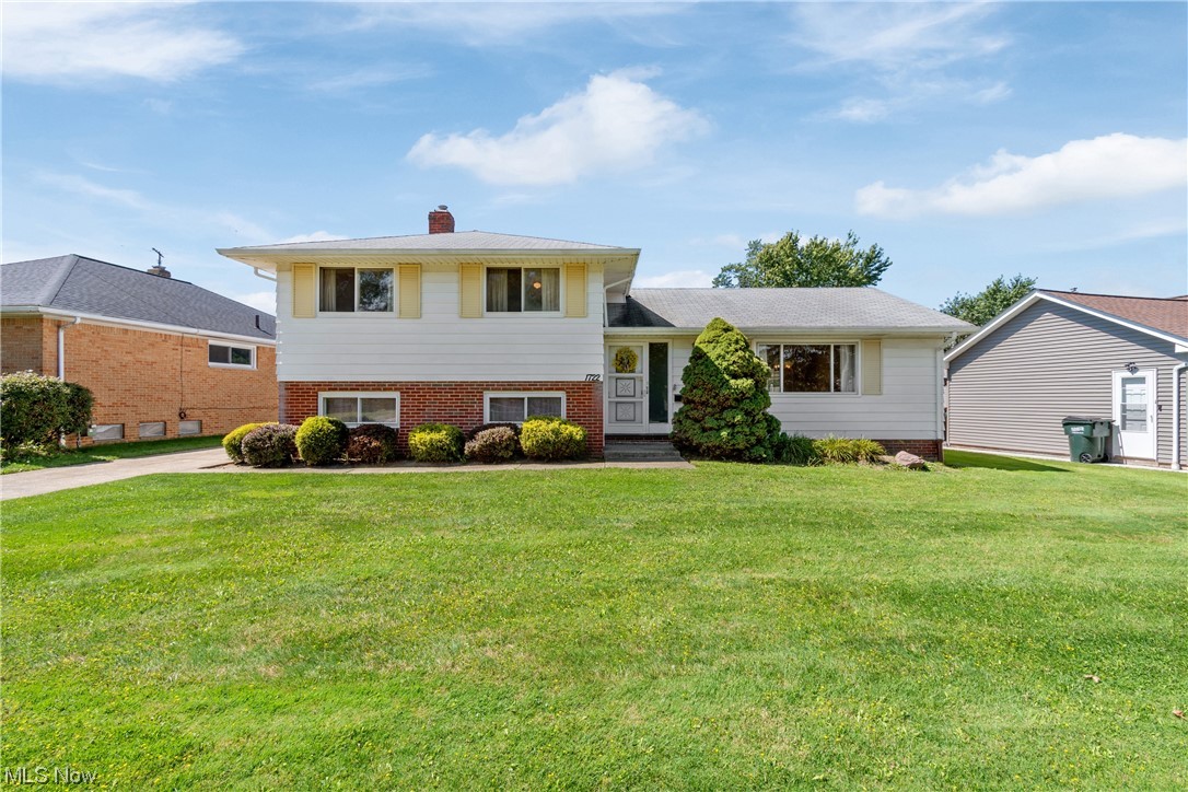 1722 Chelmsford Road Cleveland, OH 44124 - Photo 34 of 34 Tri-level home featuring a front lawn