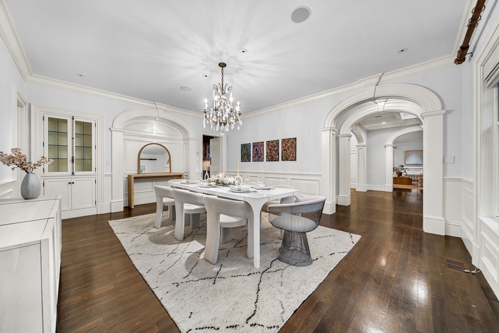 121 Livingston Road Wellesley, MA 02482 - Photo 14 of 37 a view of a dining room with furniture a chandelier and wooden floor