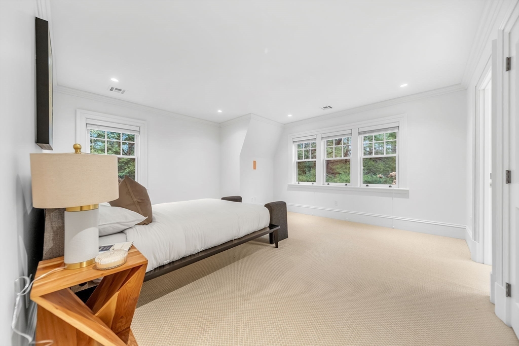 121 Livingston Road Wellesley, MA 02482 - Photo 25 of 38 a living room with furniture and a window