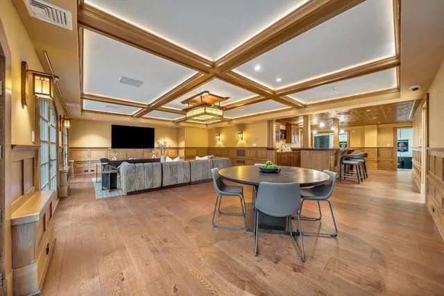a view of a kitchen with furniture and a table