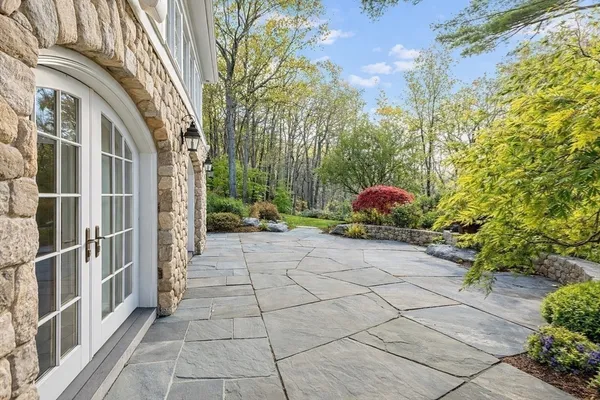 a backyard of a house with lots of green space