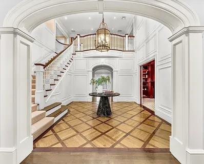 a kitchen with stainless steel appliances kitchen island granite countertop a stove a sink and a microwave