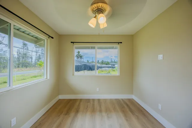 a view of a swimming pool with seating area