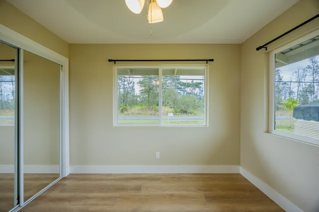 a view of swimming pool with a patio and a yard