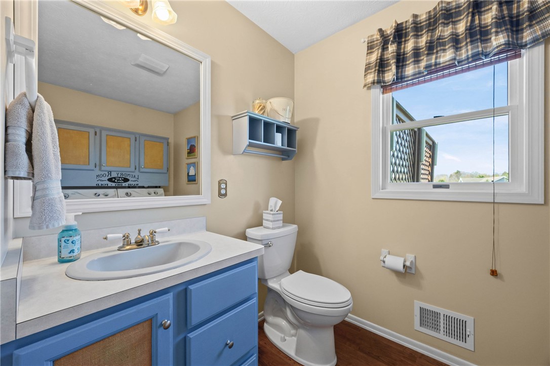 1113 Erie Street Road Macedon, NY 14502 - Photo 17 of 50 first floor powder room and laundry