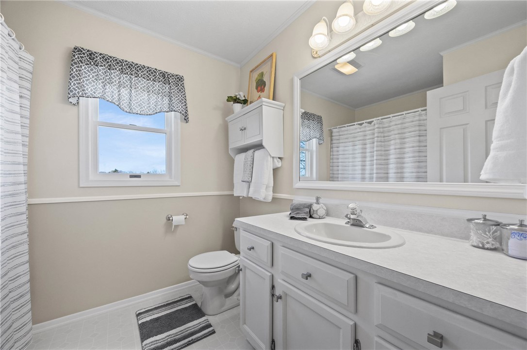 1113 Erie Street Road Macedon, NY 14502 - Photo 25 of 50 The main bathroom is bright and inviting, featurin