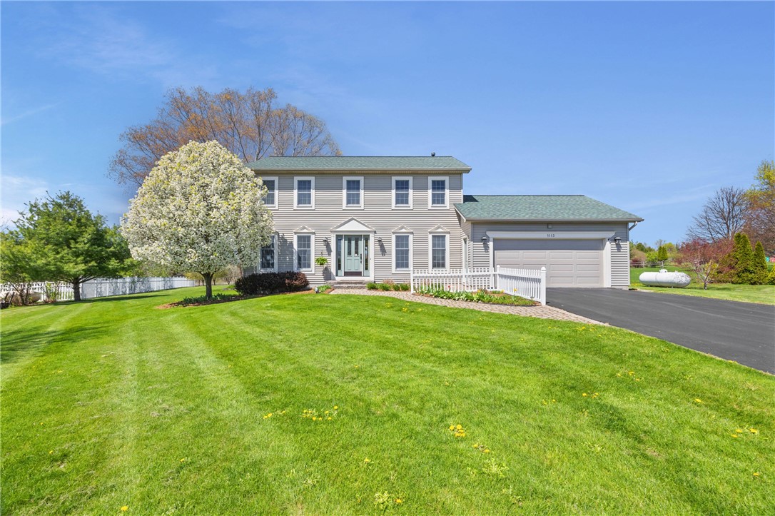 1113 Erie Street Road Macedon, NY 14502 - Photo 4 of 50 Lush green lawn and a beautifully flowering trees