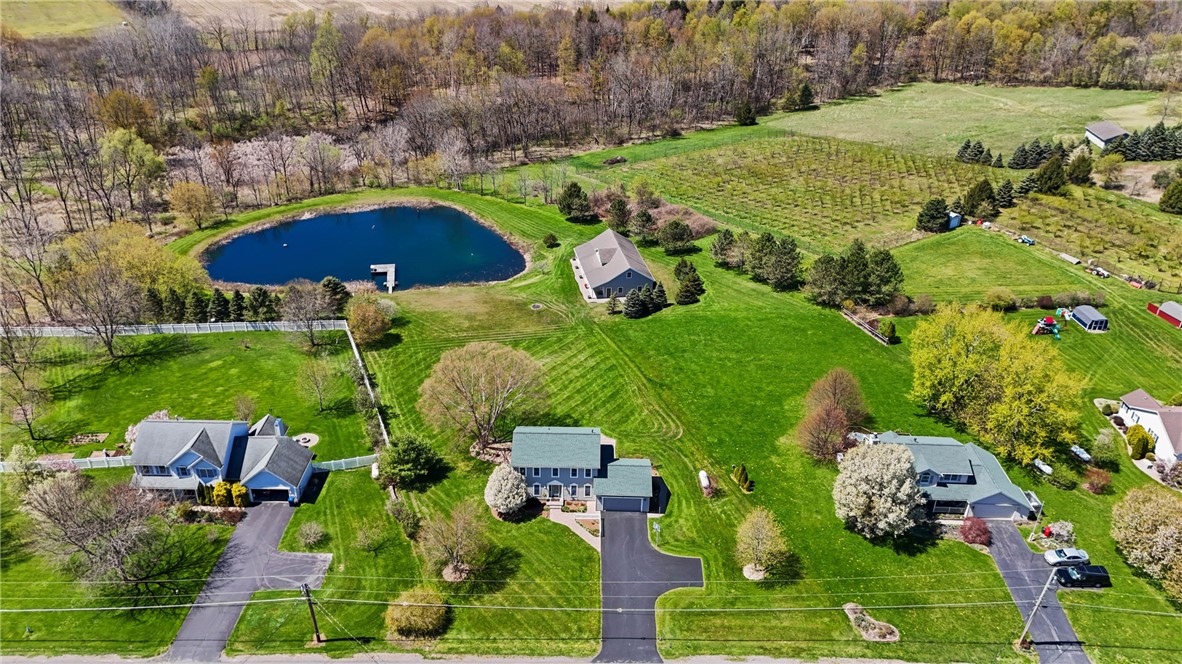 1113 Erie Street Road Macedon, NY 14502 - Photo 42 of 50 Set on 5.66 acres, this property offers a beautifu