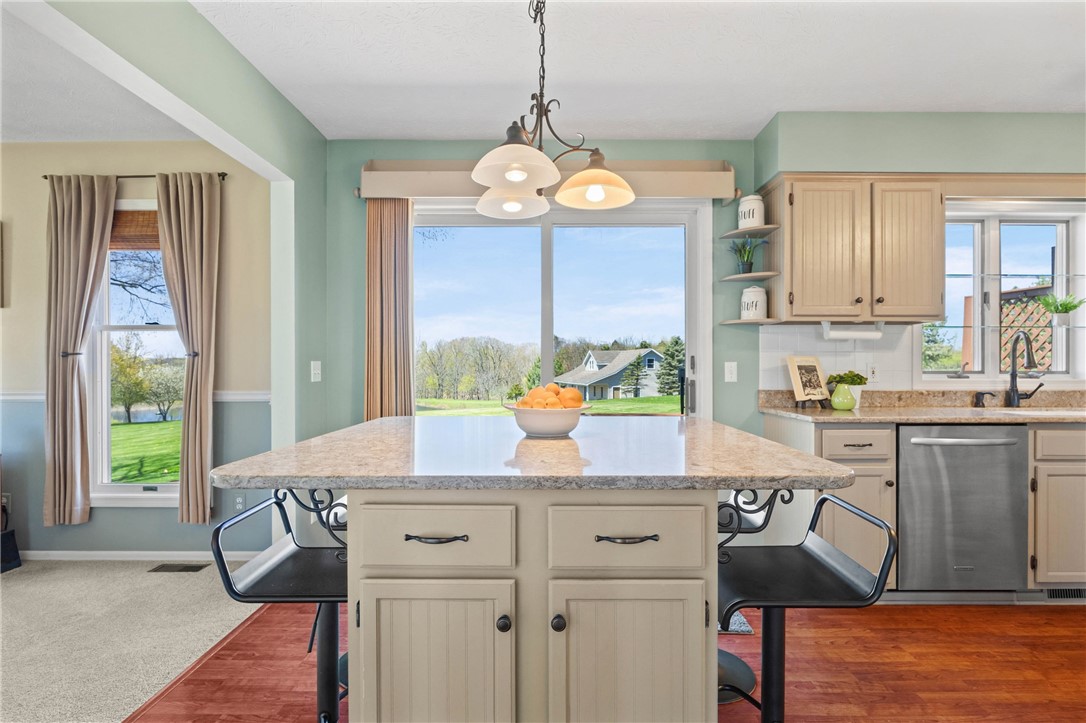 1113 Erie Street Road Macedon, NY 14502 - Photo 10 of 50 The eat in kitchen area has direct access to the