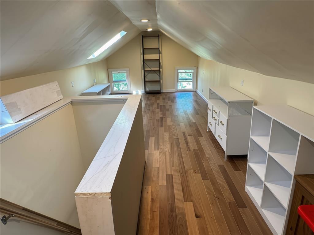 108 Effort Neola Road Effort, PA 18330 - Photo 21 of 31 An airy loft area features rich hardwood flooring and a bright skylight.