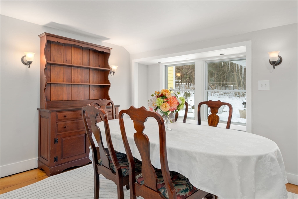 142 Plain Road Wayland, MA 01778 - Photo 5 of 14 a view of a dining room with furniture and window