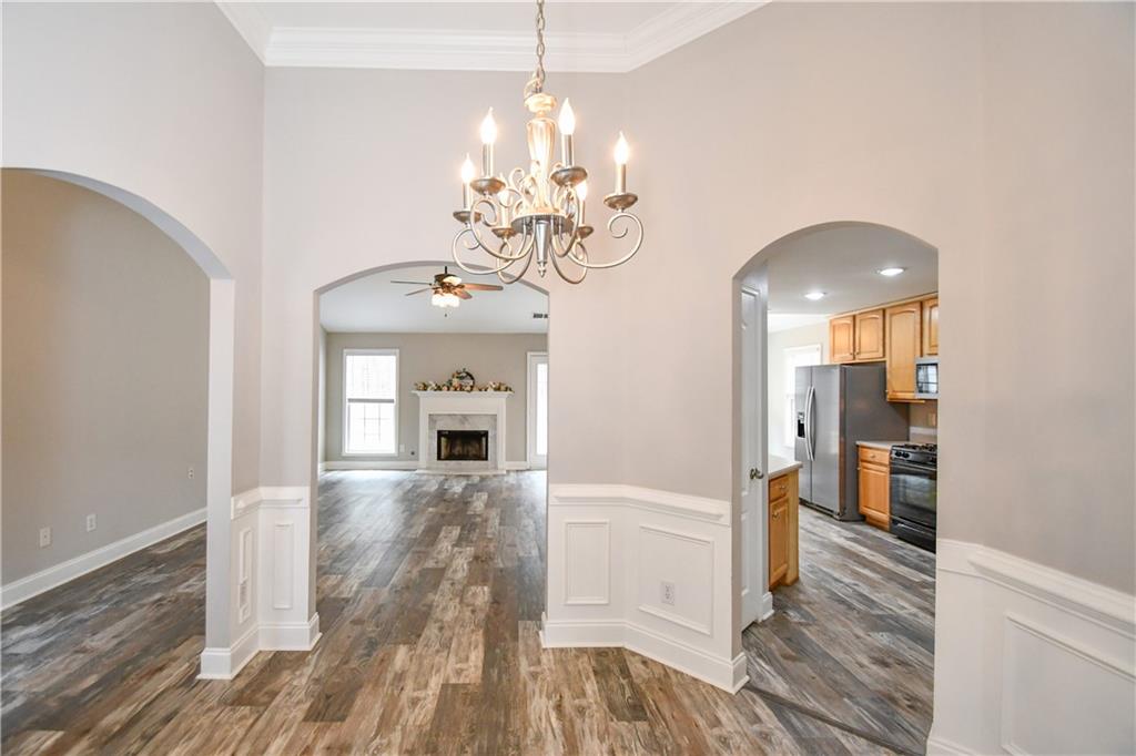 75 Ashebrooke Way Jefferson, GA 30549 - Photo 15 of 84 a view of a room with a chandelier