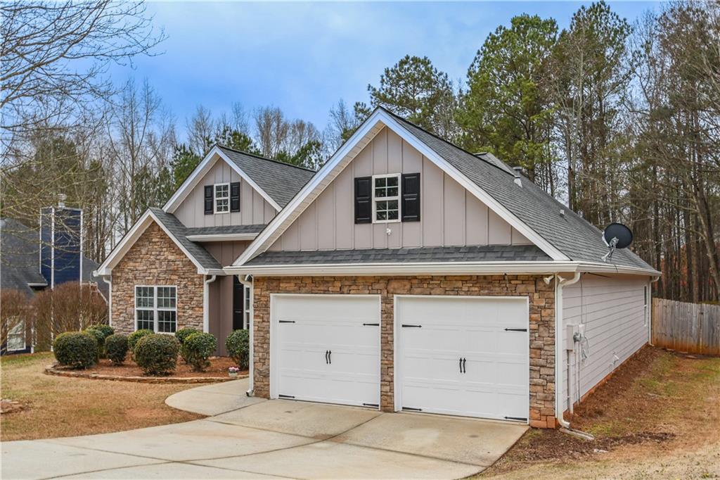 75 Ashebrooke Way Jefferson, GA 30549 - Photo 3 of 84 a view of a house with a garage