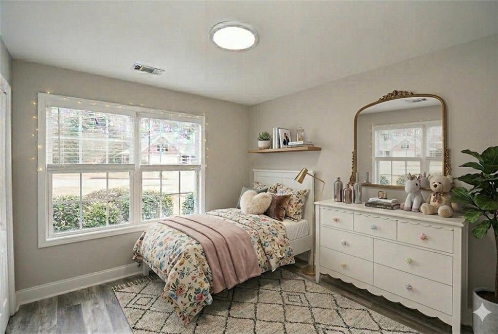 75 Ashebrooke Way Jefferson, GA 30549 - Photo 61 of 84 a bedroom with a bed and window with mirror