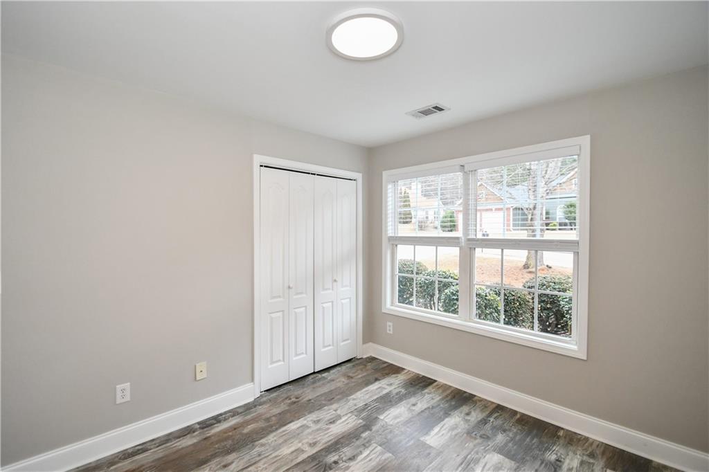 75 Ashebrooke Way Jefferson, GA 30549 - Photo 63 of 84 an empty room with windows