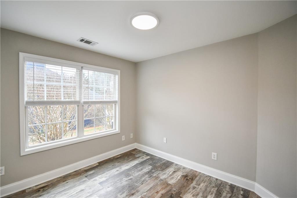 75 Ashebrooke Way Jefferson, GA 30549 - Photo 66 of 84 a view of an empty room with a window