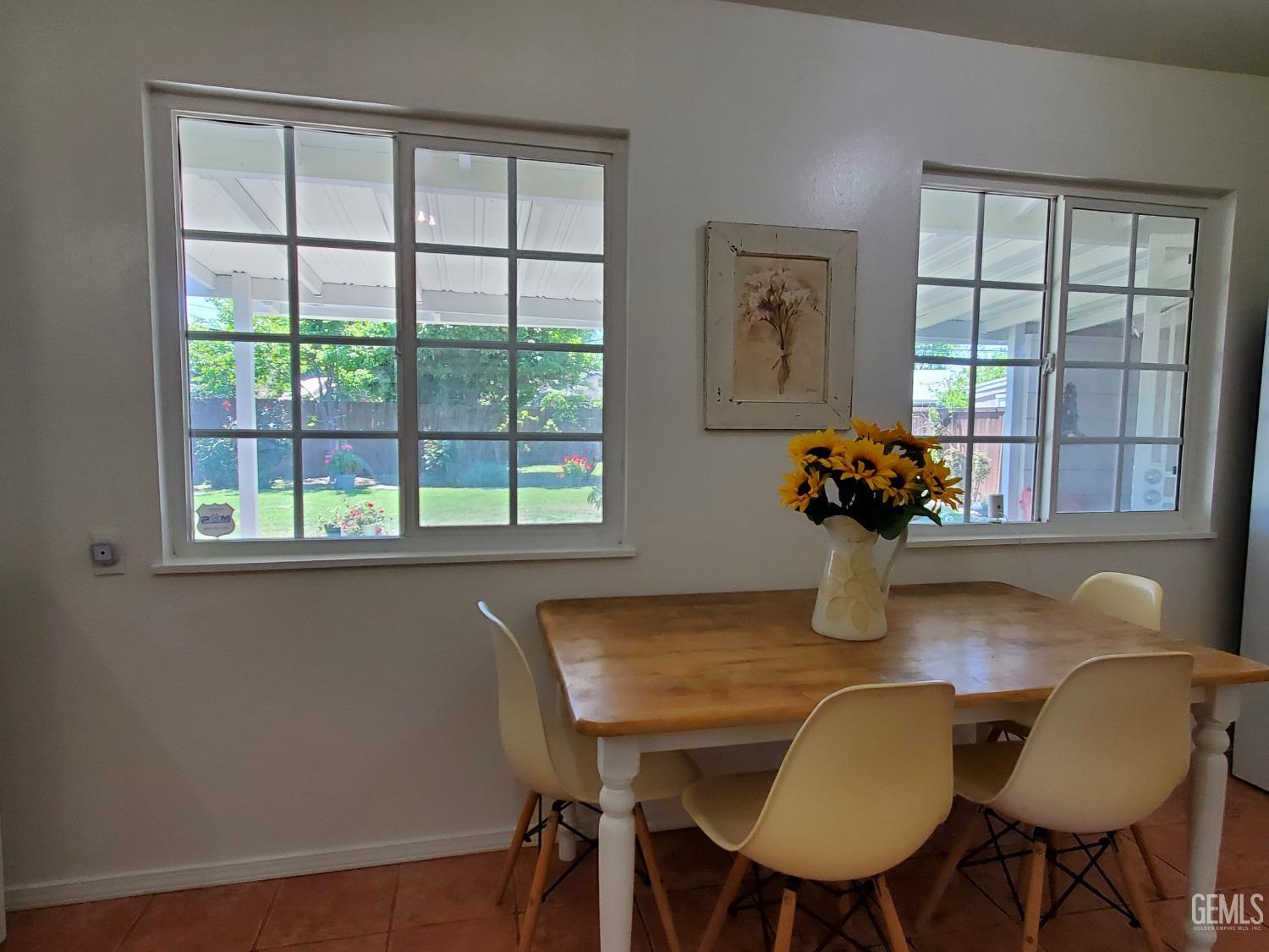 Undisclosed Address Bakersfield, CA 93309 - Photo 18 of 47 a dining room with furniture and window