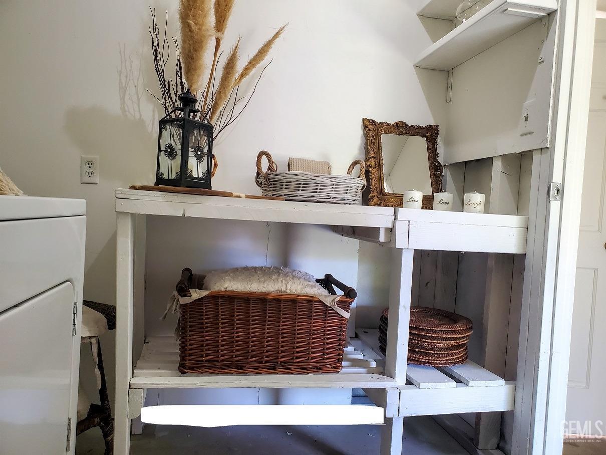 Undisclosed Address Bakersfield, CA 93309 - Photo 26 of 47 a living room with furniture and a potted plant