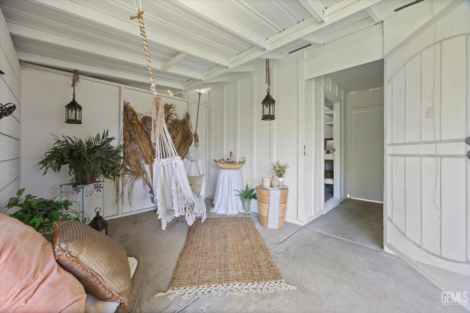 Undisclosed Address Bakersfield, CA 93309 - Photo 28 of 47 a view of a livingroom with a table and chairs