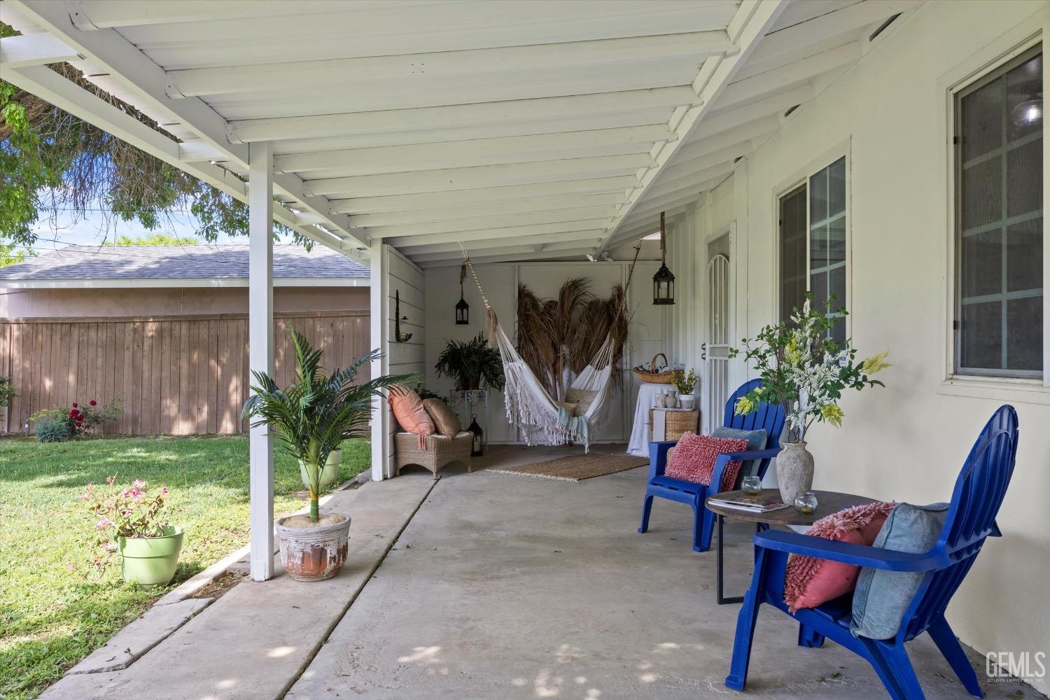 Undisclosed Address Bakersfield, CA 93309 - Photo 31 of 47 a view of a porch with furniture and a yard