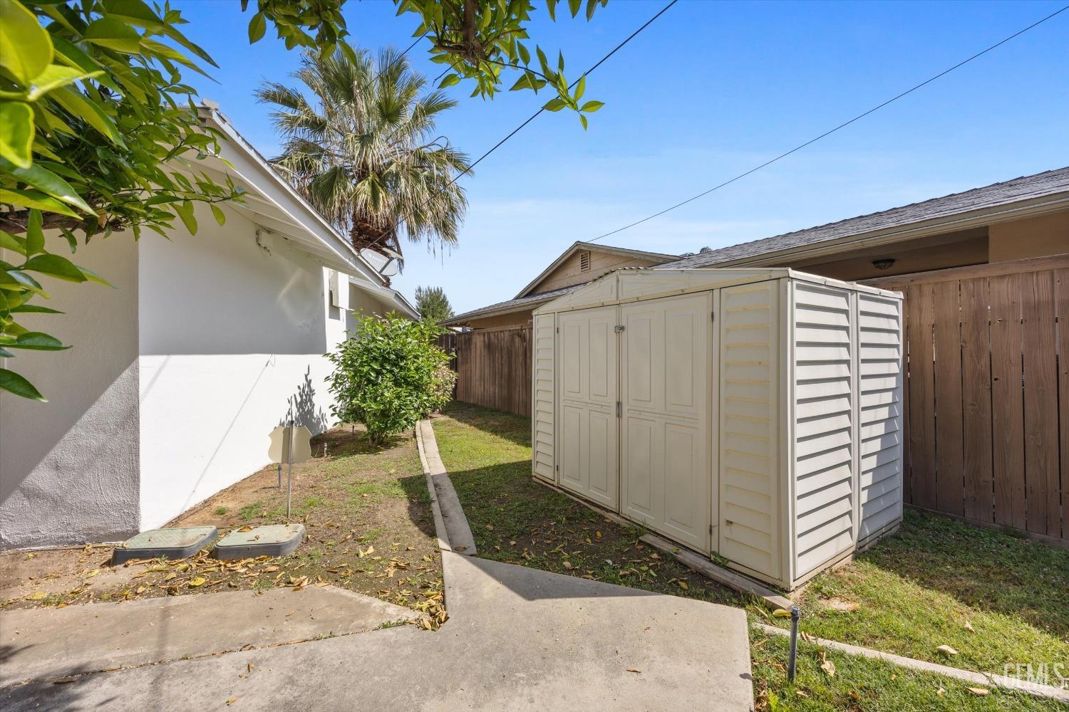 Undisclosed Address Bakersfield, CA 93309 - Photo 36 of 47 a plant that is in front of a house