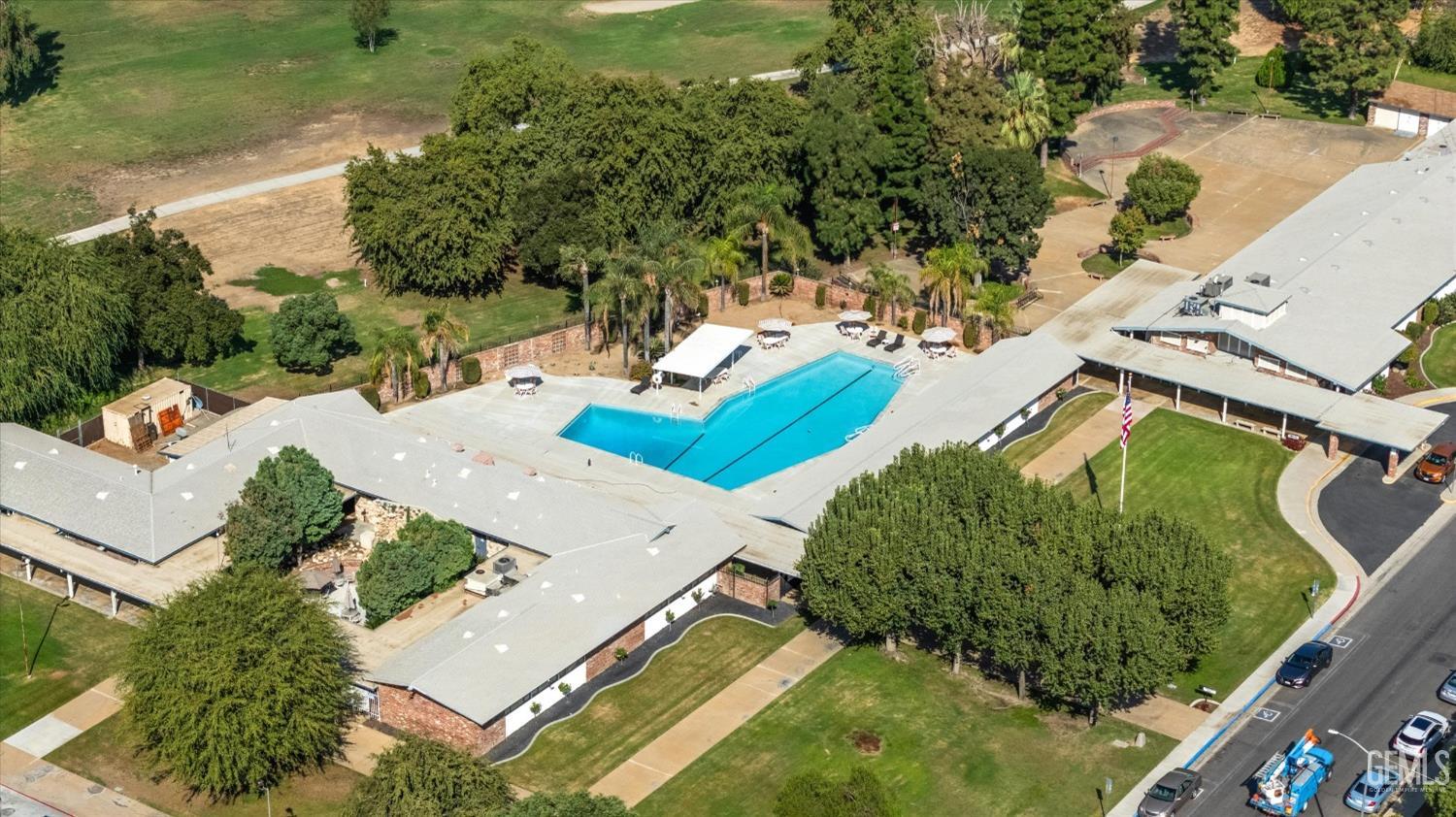 Undisclosed Address Bakersfield, CA 93309 - Photo 45 of 47 an aerial view of a house with yard swimming pool and outdoor seating