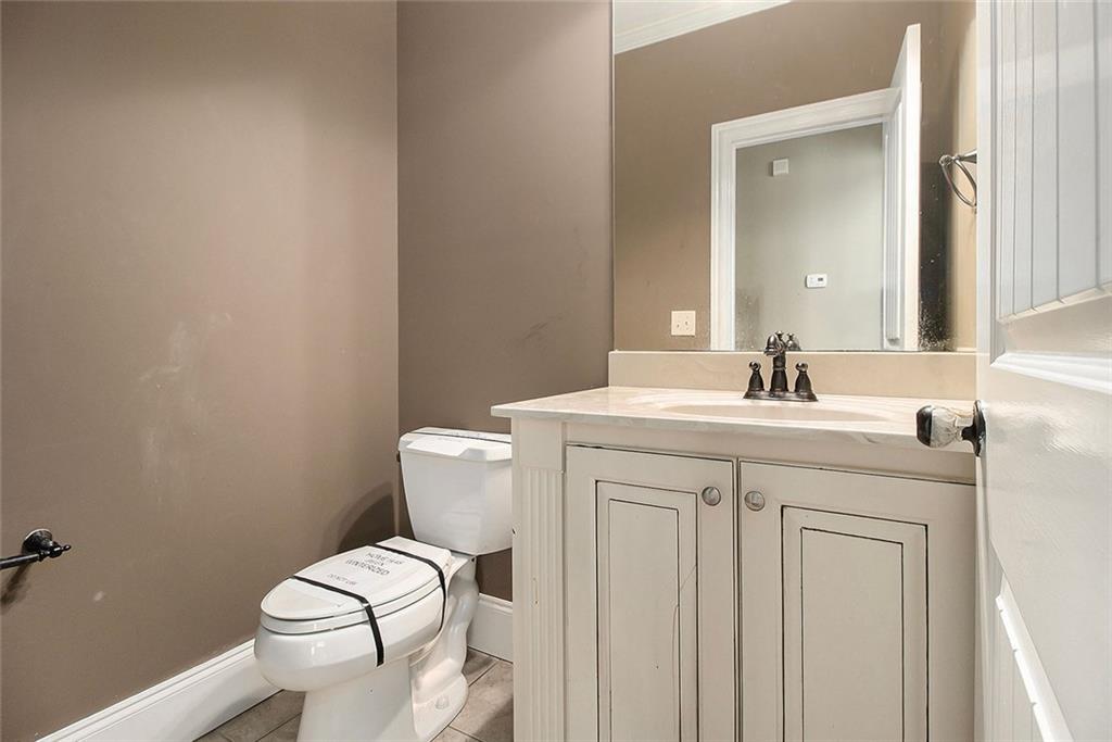 70 Alcovy Reserve Way Covington, GA 30014 - Photo 13 of 30 a bathroom with a sink toilet and a mirror