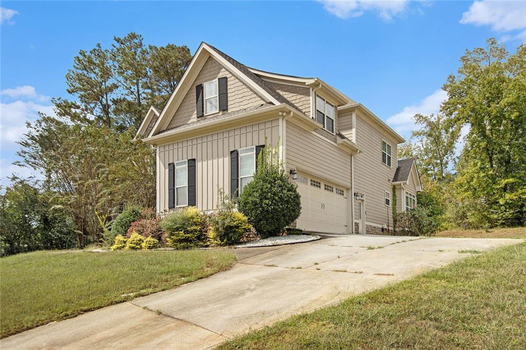 70 Alcovy Reserve Way Covington, GA 30014 - Photo 2 of 30 a front view of a house with a yard