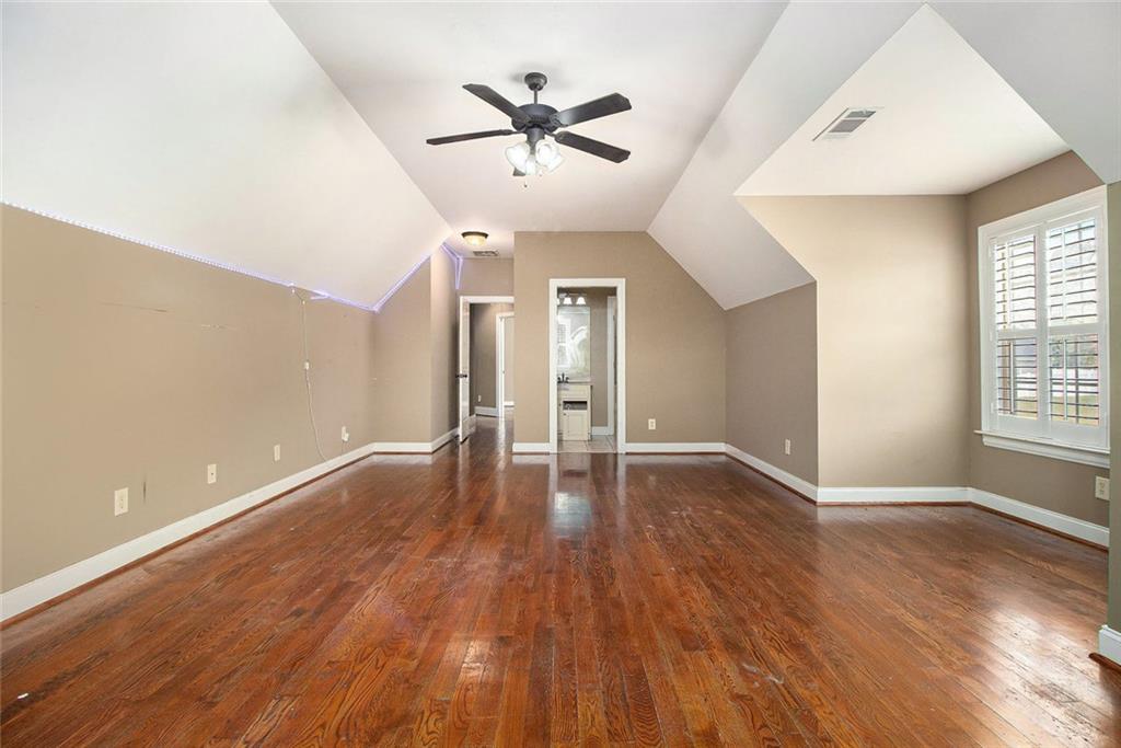 70 Alcovy Reserve Way Covington, GA 30014 - Photo 27 of 30 wooden floor in an empty room with a window