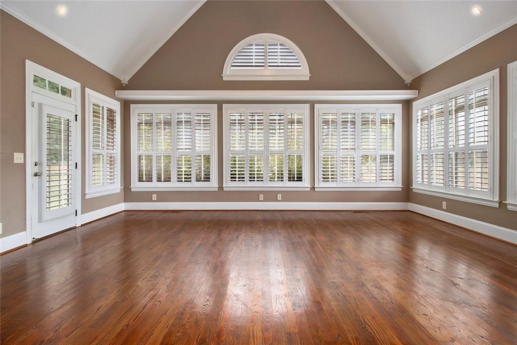 70 Alcovy Reserve Way Covington, GA 30014 - Photo 28 of 30 a view of an empty room with wooden floor and a window